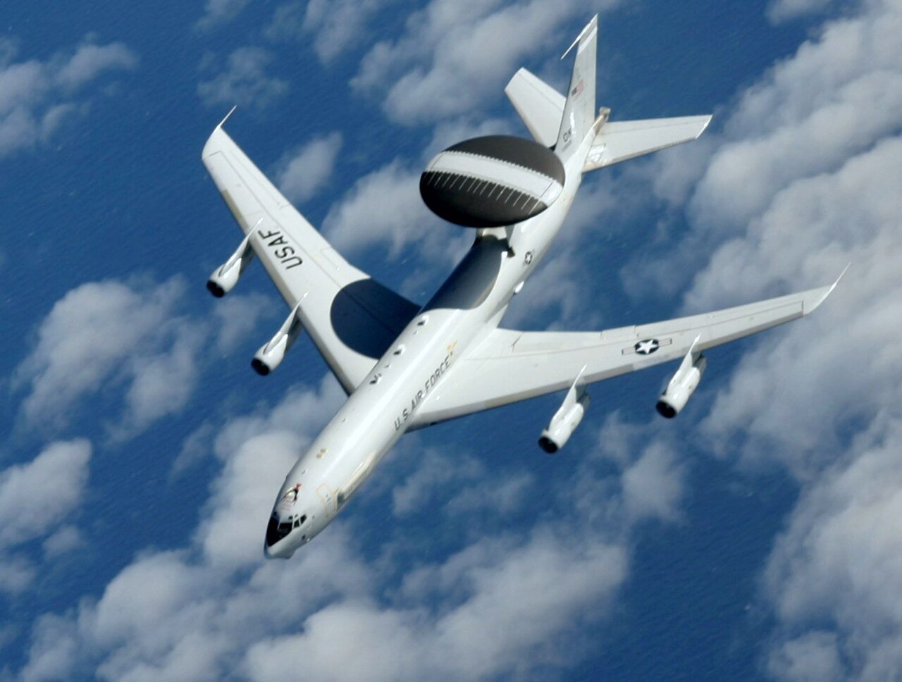 E-3 Sentry AWACS aircraft flying a mission from Tinker Air Force Base with distinctive rotating radar dome / U.S. Air Force