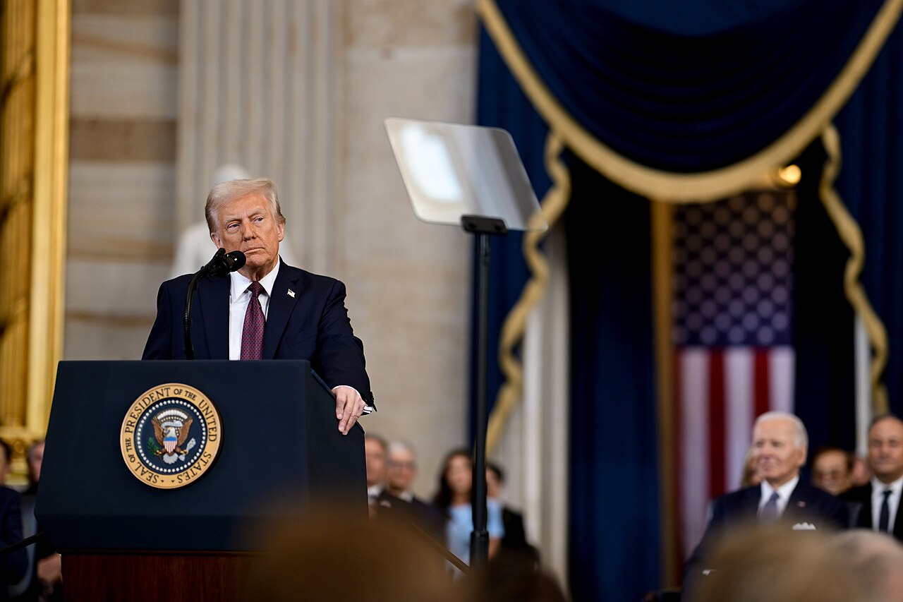 President Donald Trump delivering the inaugural address at a podium / Wikimedia Commons