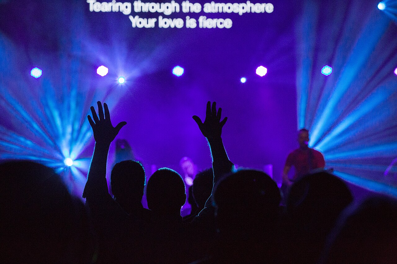 Interior view of a modern church worship service with congregation seated in pews / 2-42 Community Church, Brighton, United States