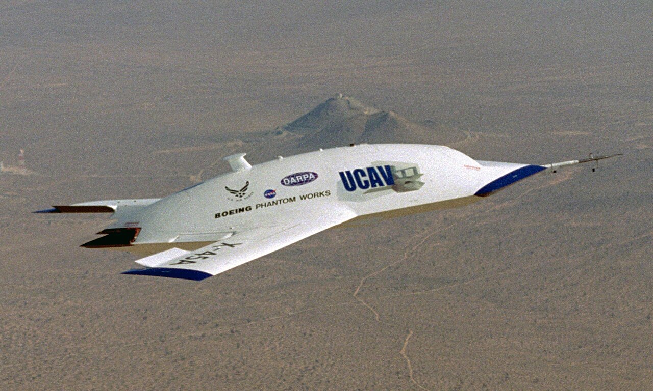Boeing X-45A Unmanned Combat Air Vehicle UCAV with landing gear raised in flight / Public Domain (NASA)
