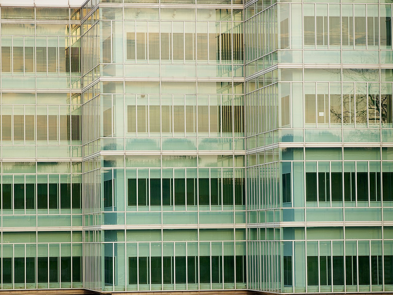 The New Headquarters Building of the CIA in Langley, Virginia, showing the two six-story office towers built into the hillside / Public Domain / Central Intelligence Agency via Flickr