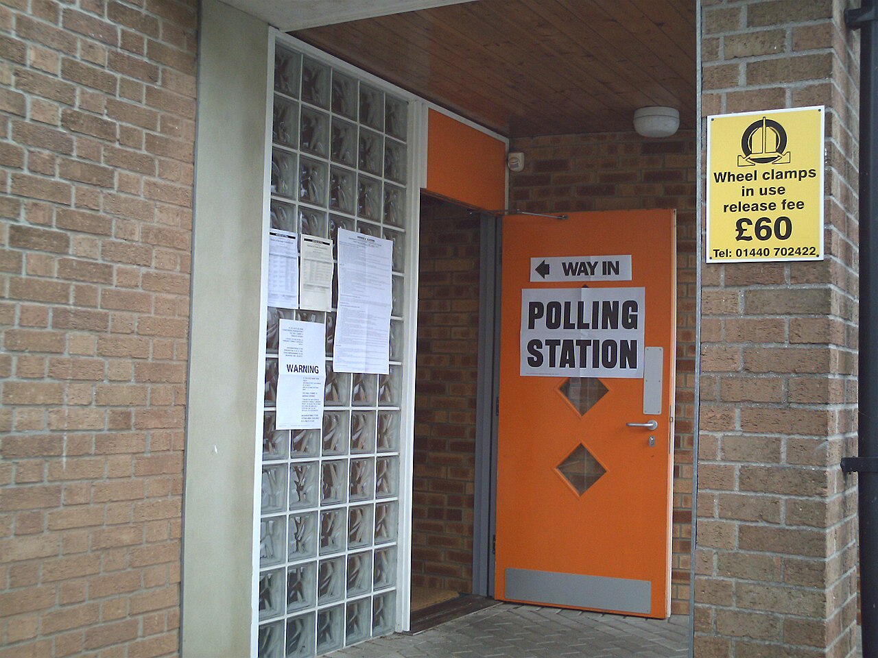 Entrance to a polling station in a Methodist Church in Haverhill, Suffolk, with candidate lists and voting information posters on display / No attribution provided