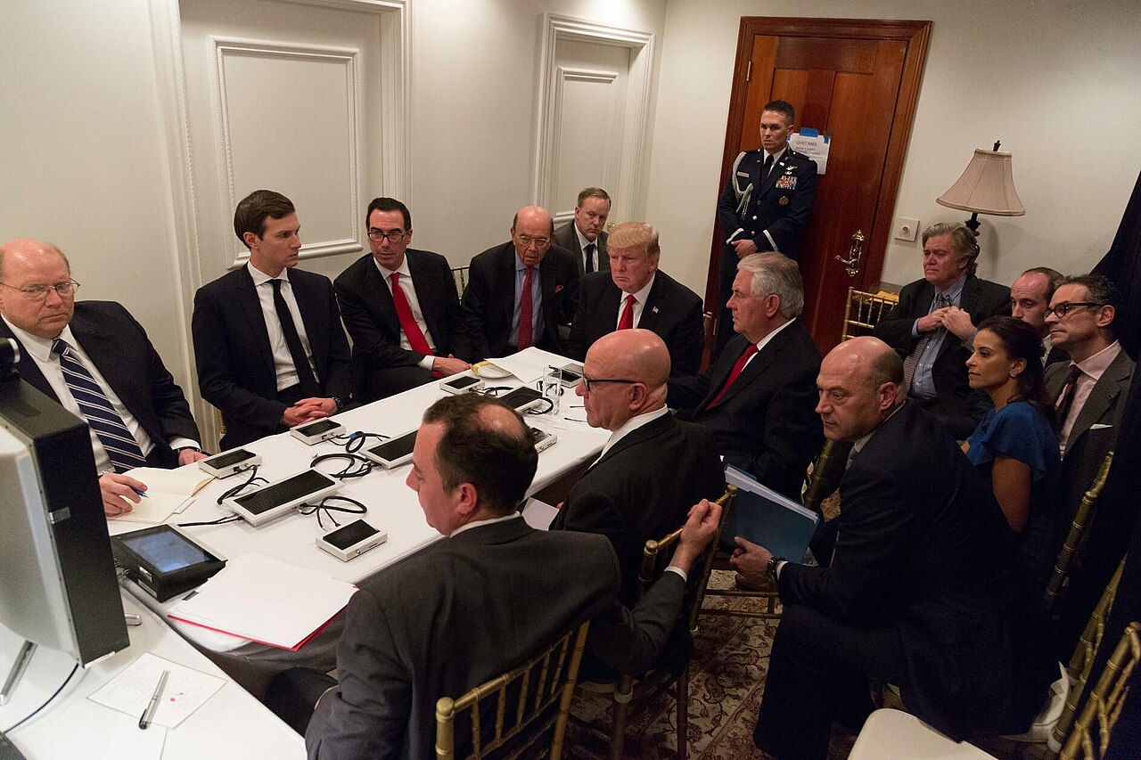 President Donald Trump receives a military strike briefing from his National Security team at Mar-a-Lago in April 2017 / Official White House Photo by Shealah Craighead