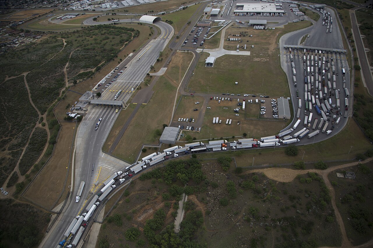 U.S. Customs and Border Protection agents checking trucks traveling over the Rio Grande at the World Trade Crossing International Bridge in Laredo, Texas / Photographer: Donna Burton