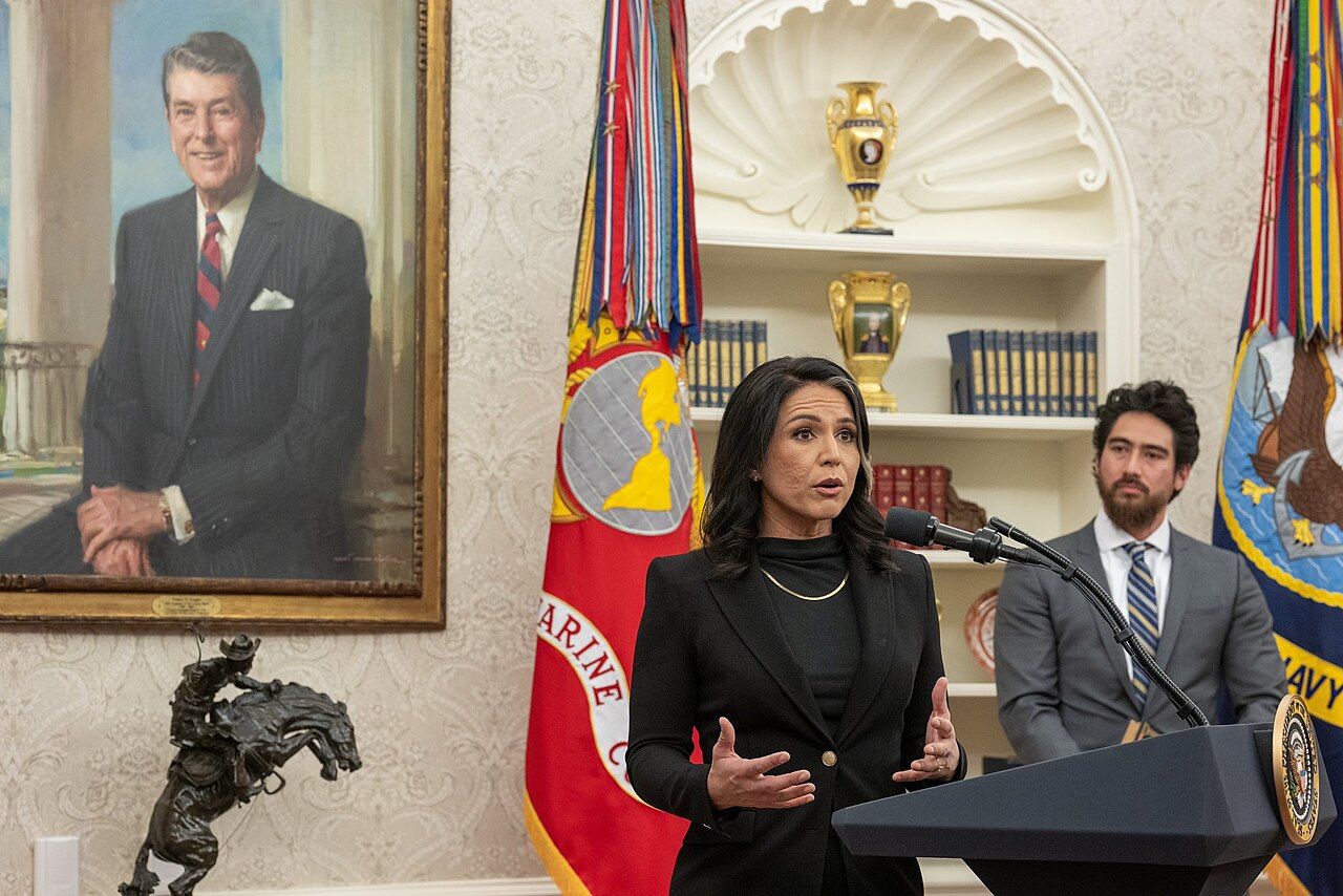 Director Tulsi Gabbard speaking in the Oval Office after her 2025 swearing-in ceremony as Director of National Intelligence / Public domain (White House photo)