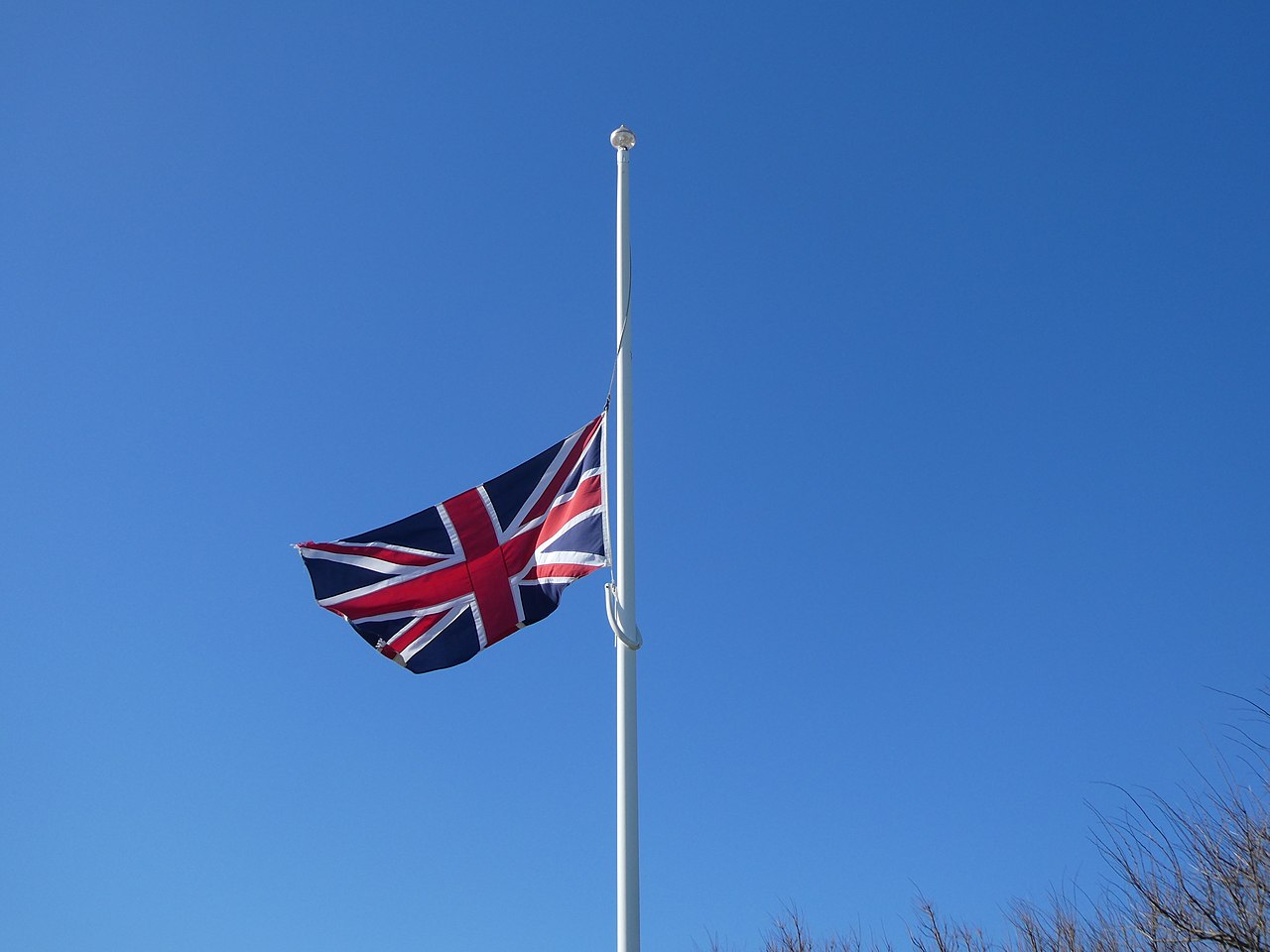 A Union Jack flag flying at half-mast on a building in Overstrand, Norfolk / Photographer not specified